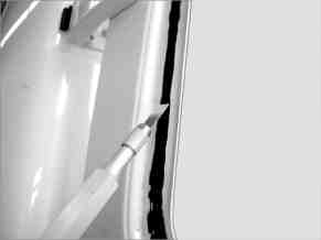 Prepare rear door window cutout for installation